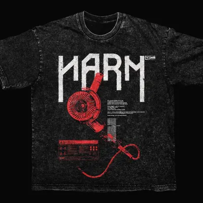 Black acid wash tee: the HARM logo in white above a large red angle grinder illustration and a warning label.